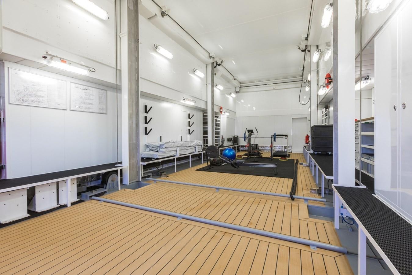 a room with a large white board aboard GAME CHANGER Yacht for Sale