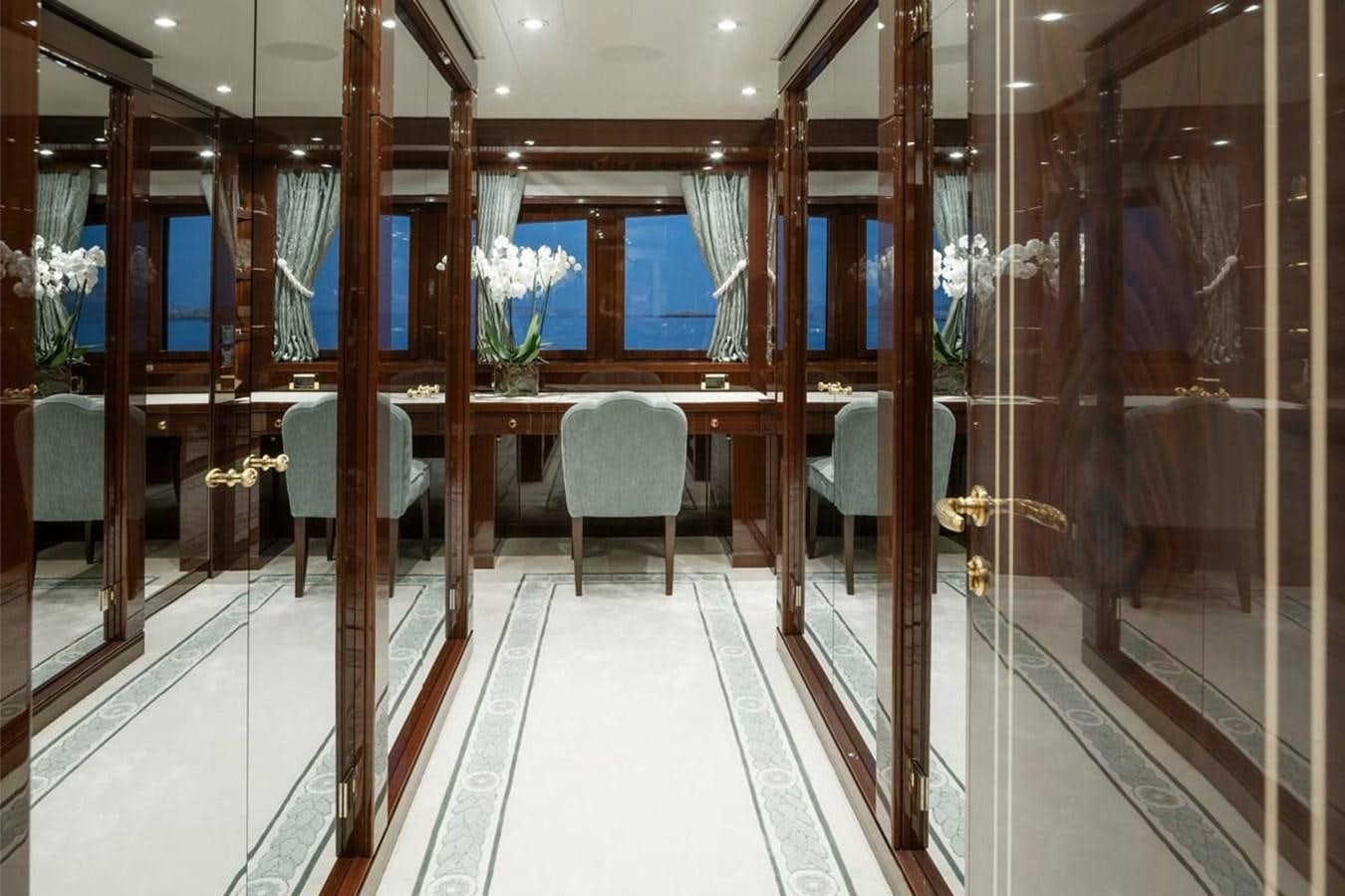 a room with a glass wall aboard LA FAMILIA Yacht for Sale