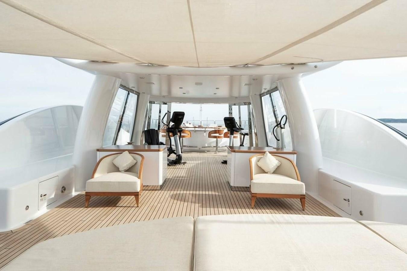 a room with a bed and a desk aboard LA FAMILIA Yacht for Sale