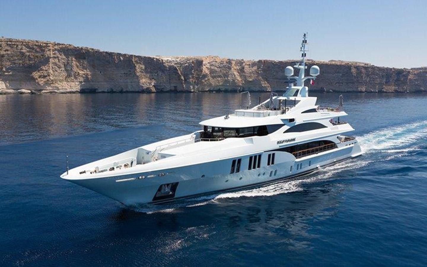 a boat on the water aboard OCEAN PARADISE Yacht for Sale