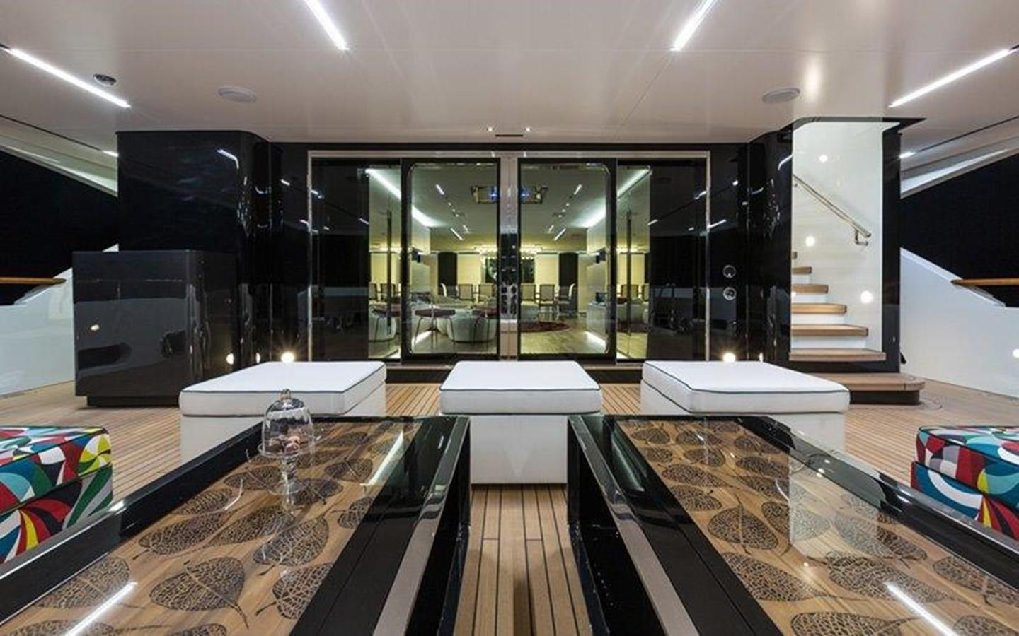 a room with a large glass display case and a large glass display case aboard OCEAN PARADISE Yacht for Sale