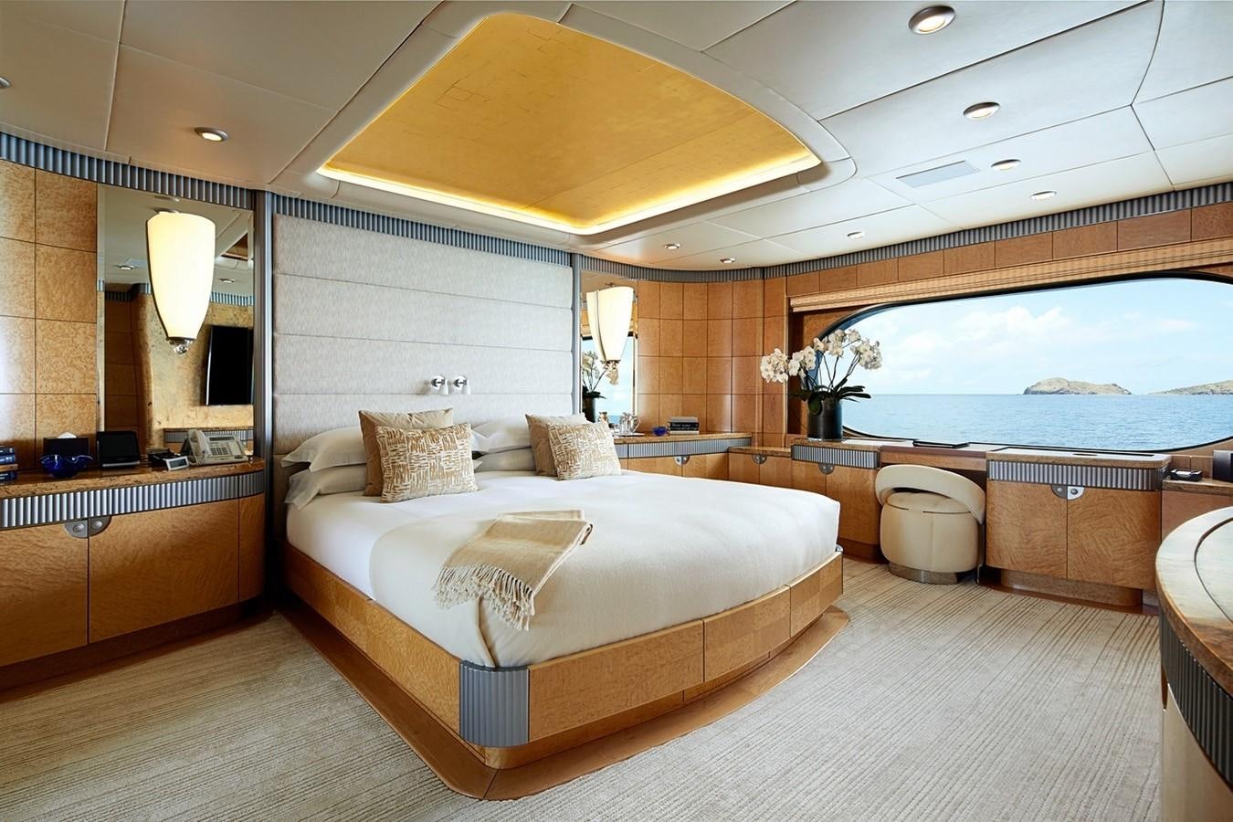 a large bedroom with a large bed aboard FORTUNATE SUN Yacht for Sale