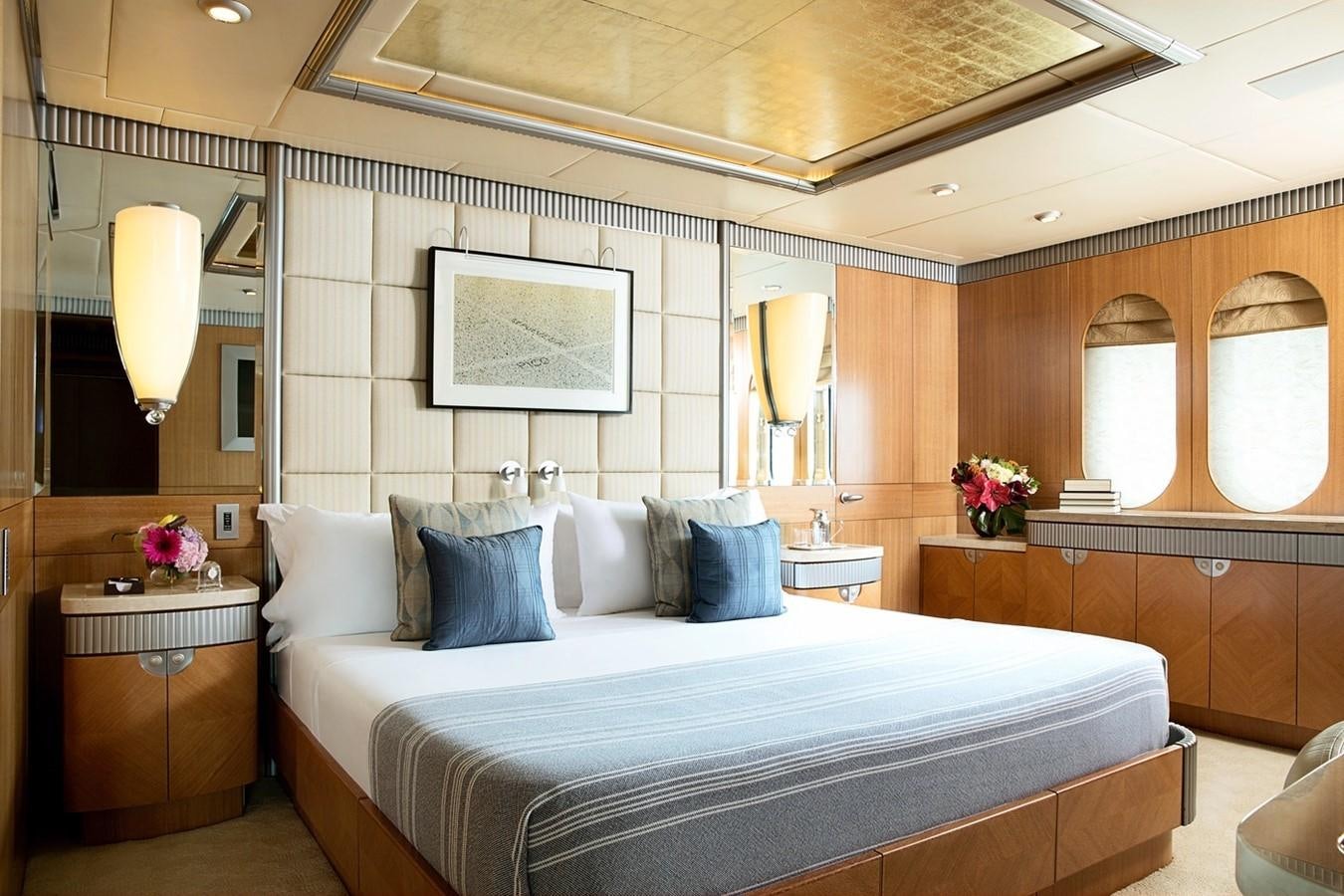 a bed in a room aboard FORTUNATE SUN Yacht for Sale