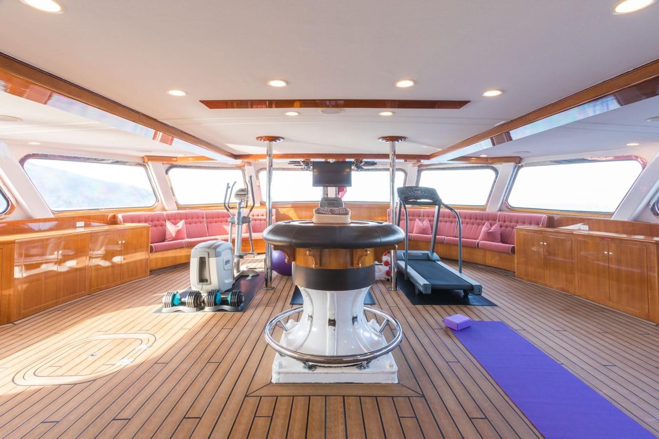 a large machine in a room aboard ITASCA Yacht for Sale