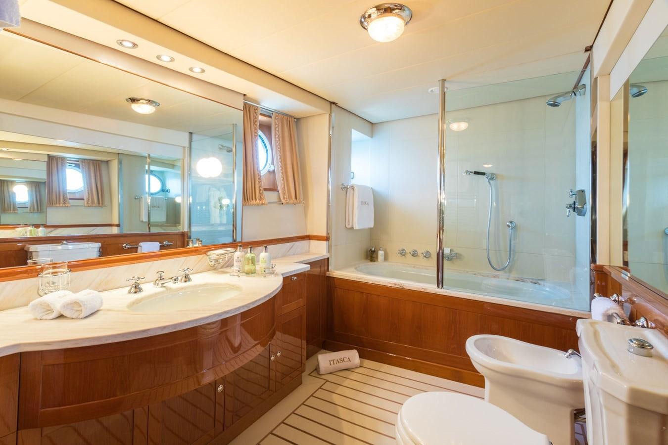 a bathroom with a large shower aboard ITASCA Yacht for Sale