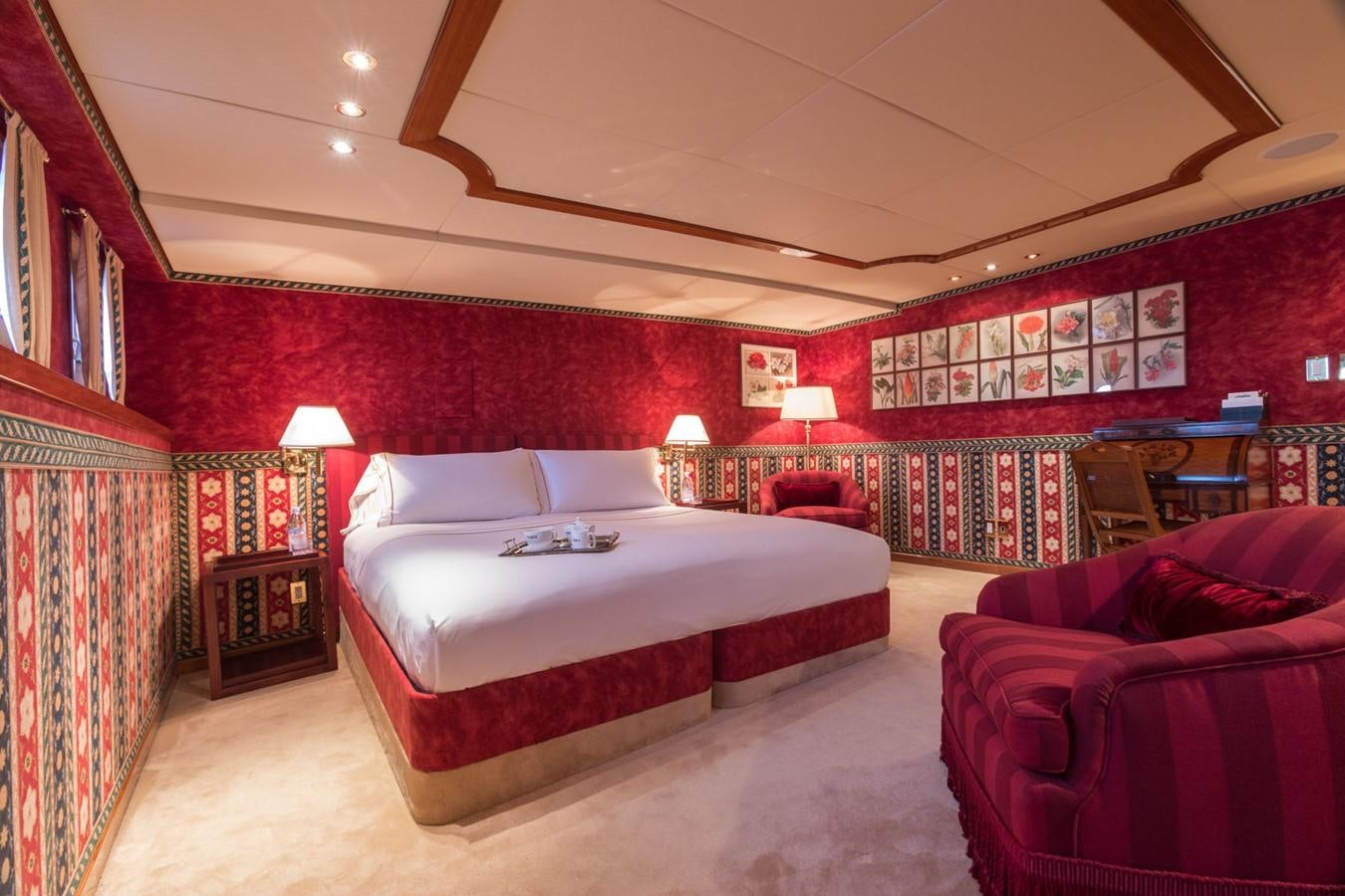 a large bed in a room aboard ITASCA Yacht for Sale