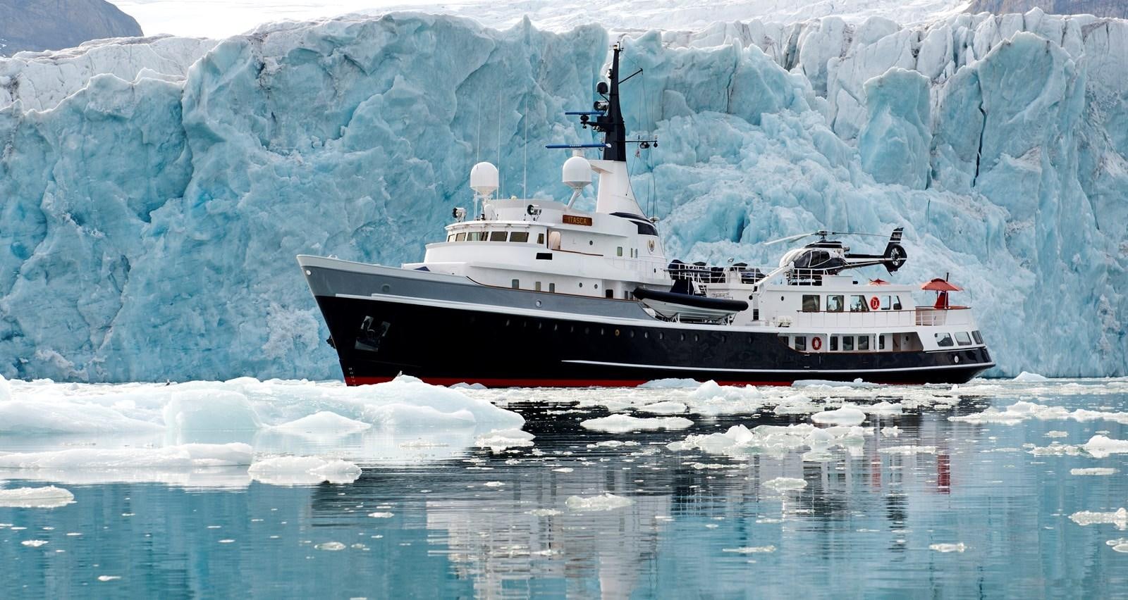 a boat in the water aboard ITASCA Yacht for Sale