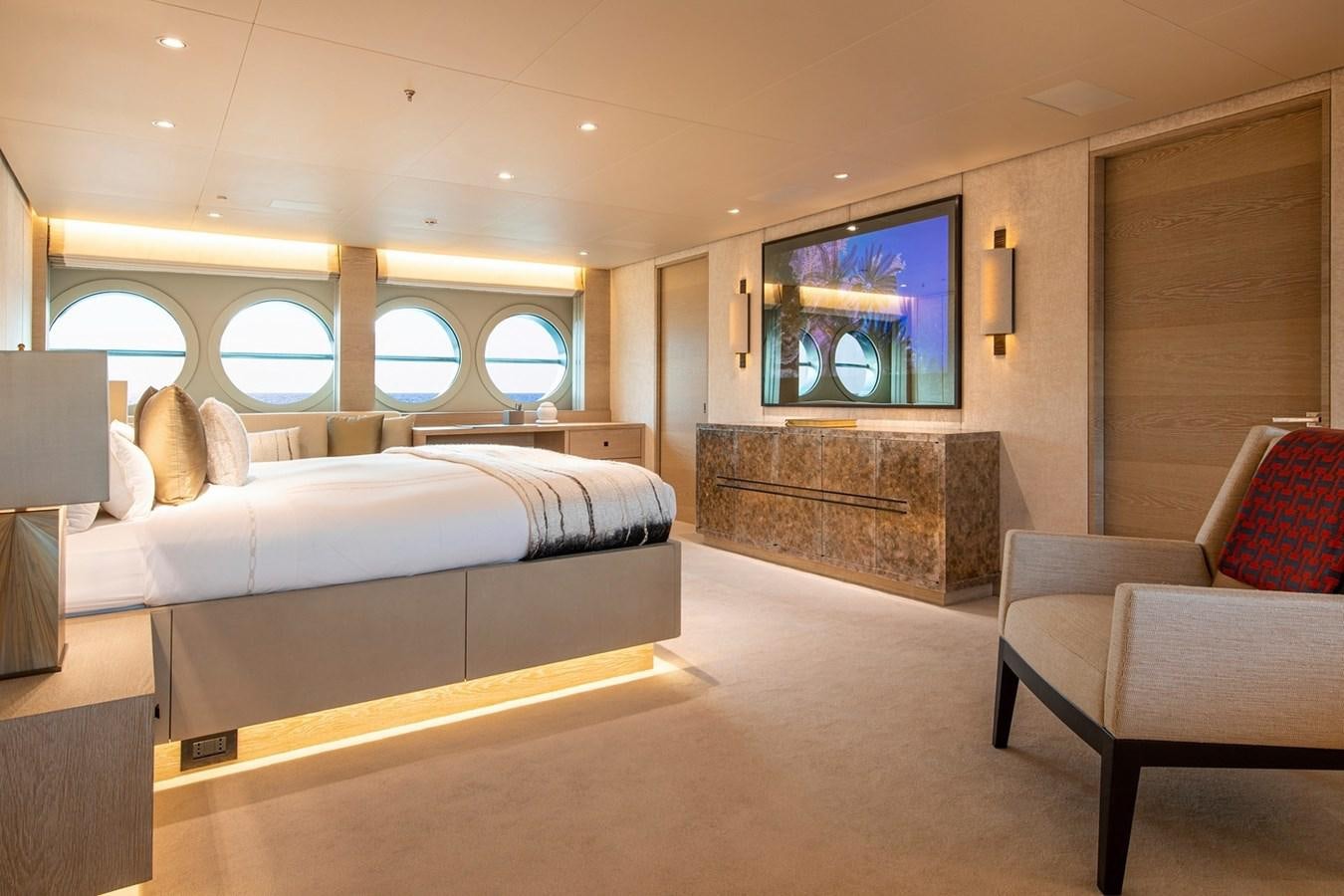 a bedroom with a large bed aboard SANAM Yacht for Sale