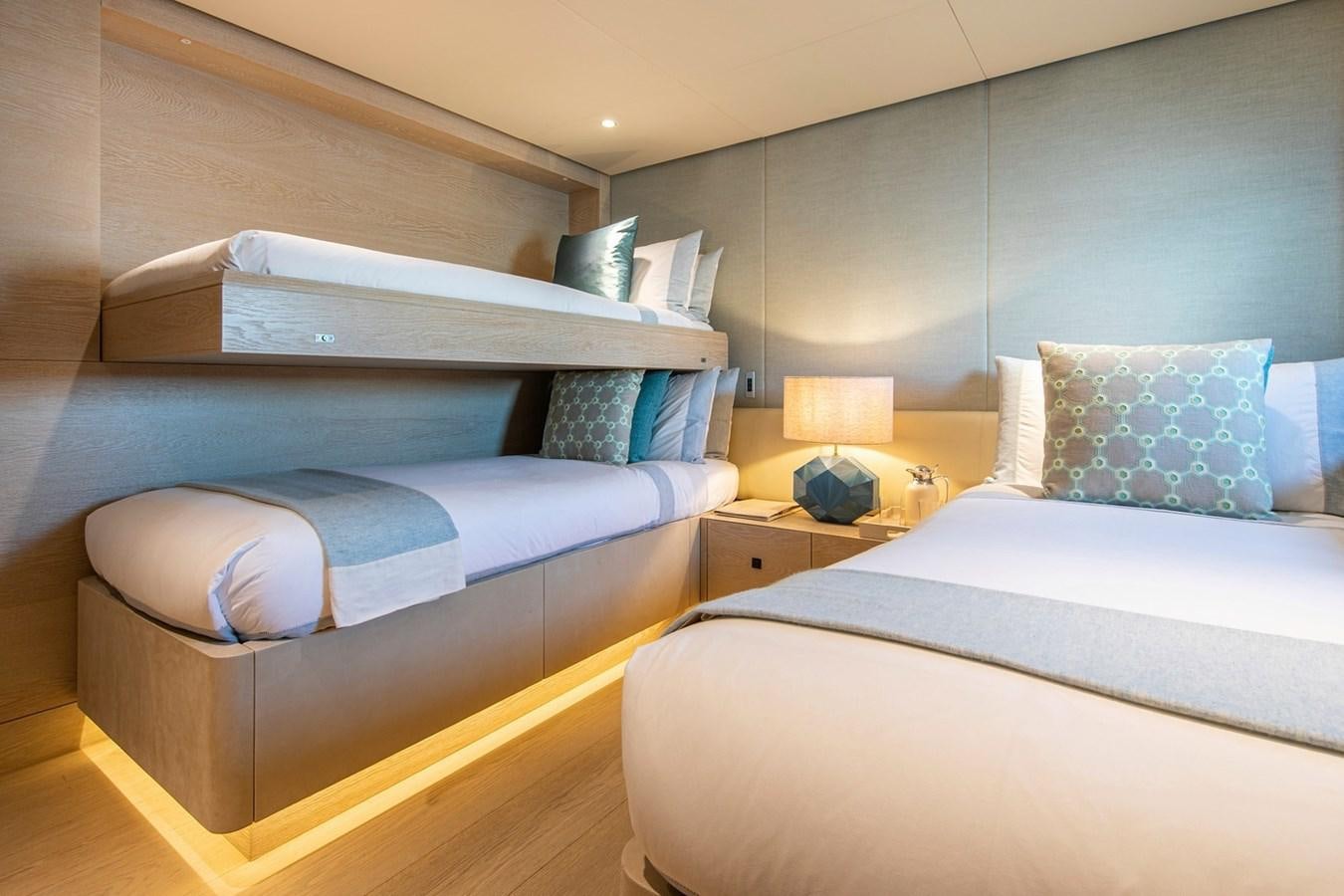 a couple of beds in a room aboard SANAM Yacht for Sale