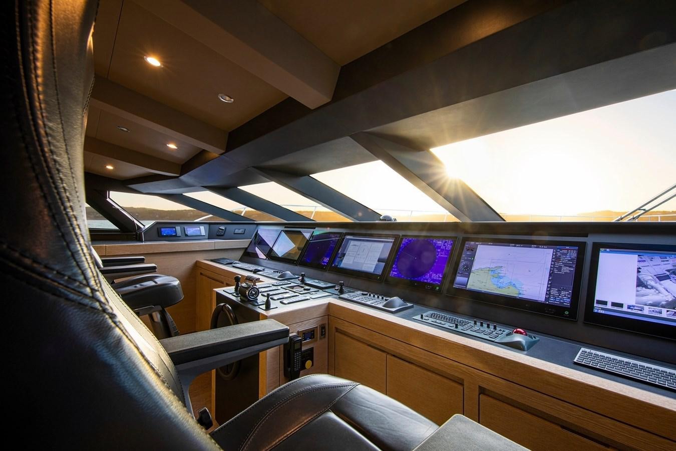 a room with many monitors aboard SANAM Yacht for Sale