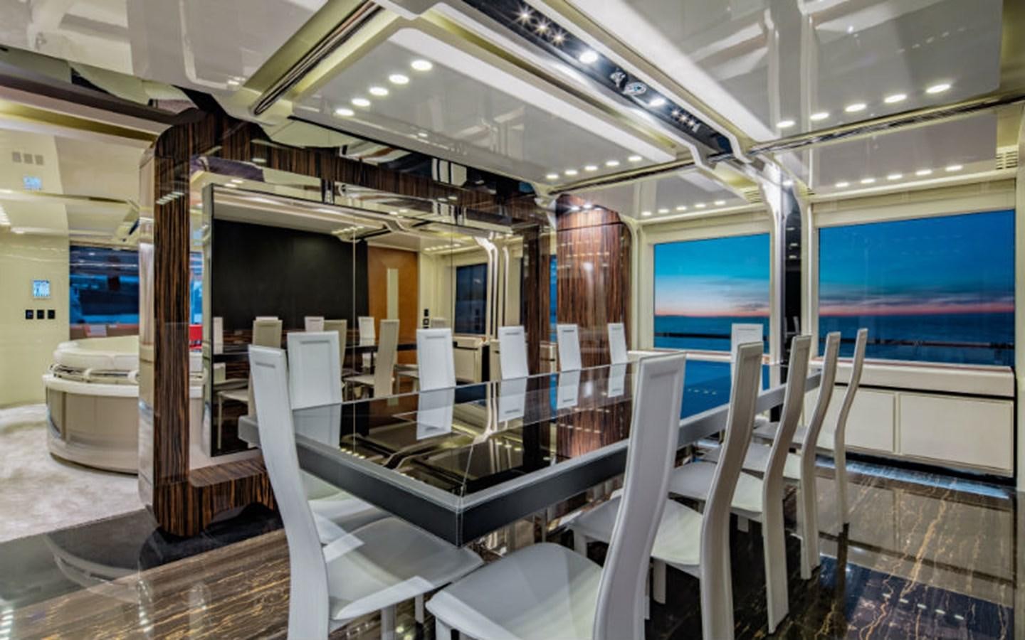 a room with chairs and tables aboard EUPHORIA Yacht for Sale