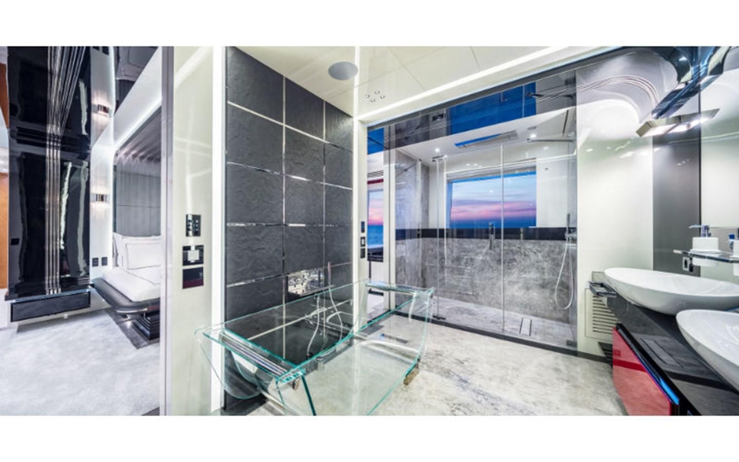 a bathroom with a glass shower aboard EUPHORIA Yacht for Sale