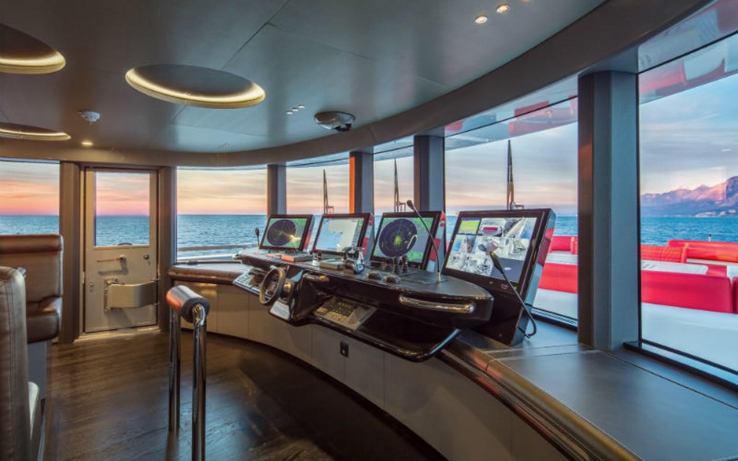 a room with a table and chairs aboard EUPHORIA Yacht for Sale