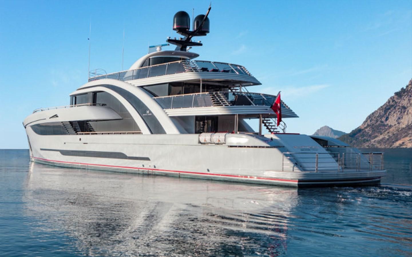 a large white boat on the water aboard EUPHORIA Yacht for Sale