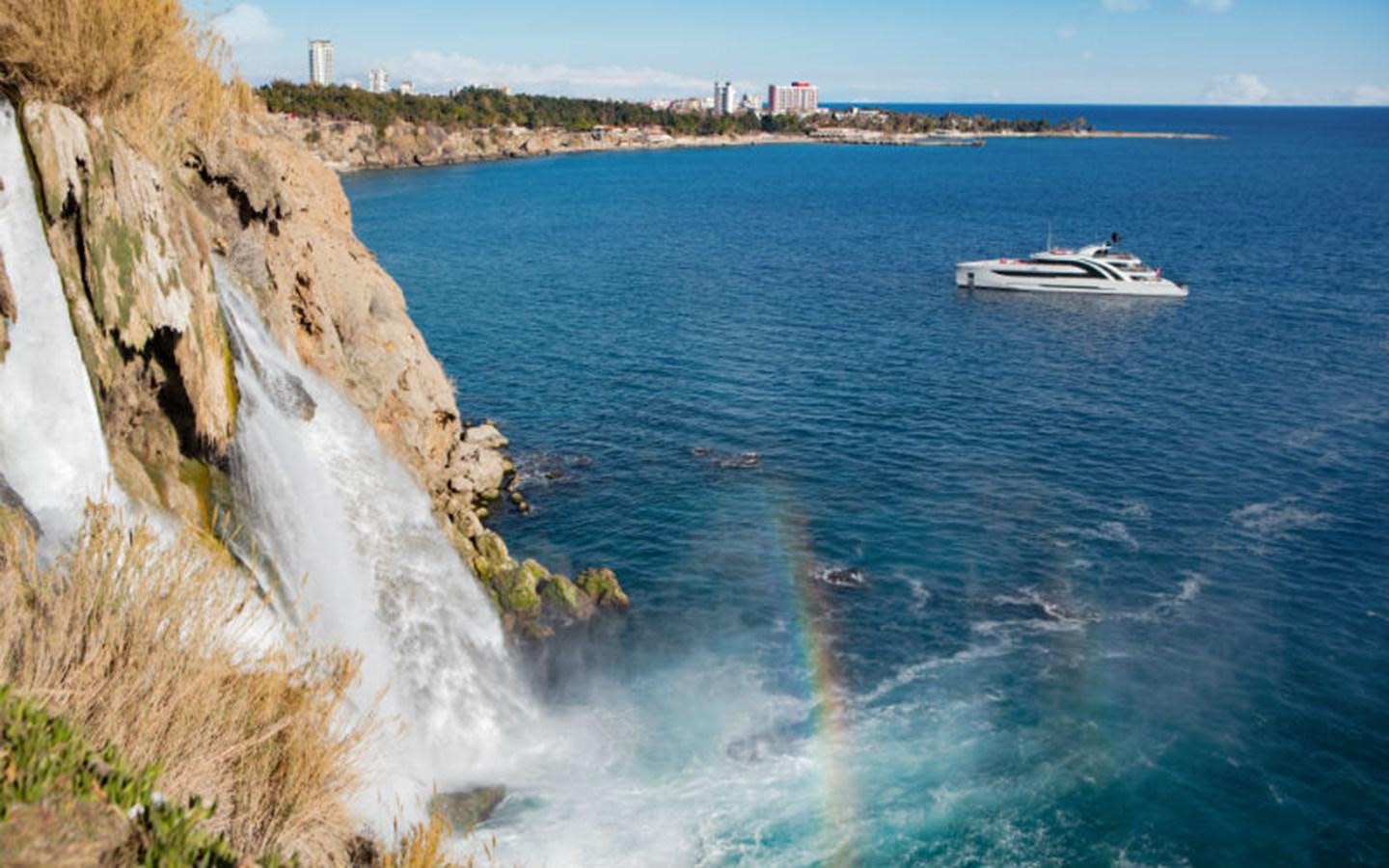 a boat sailing on the water aboard EUPHORIA Yacht for Sale