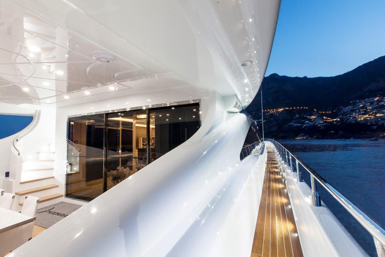 a building with a balcony aboard APRICITY Yacht for Sale