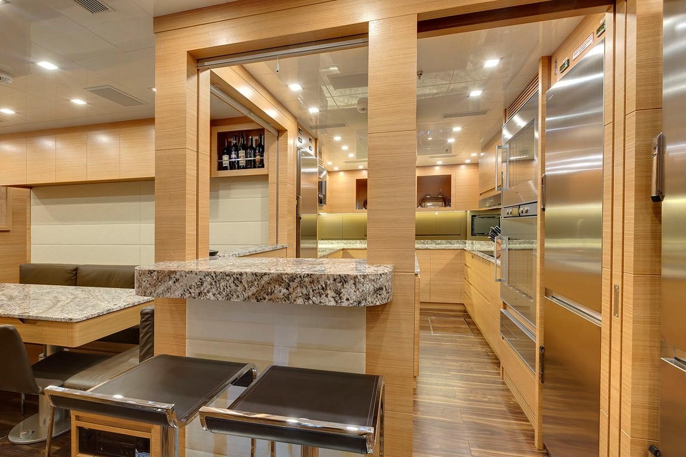 a room with a large glass wall aboard APRICITY Yacht for Sale