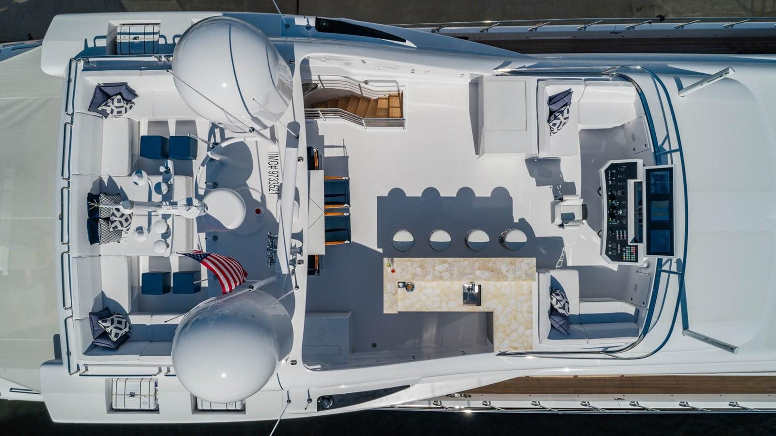 a white robot with blue and red stripes on it aboard APRICITY Yacht for Sale