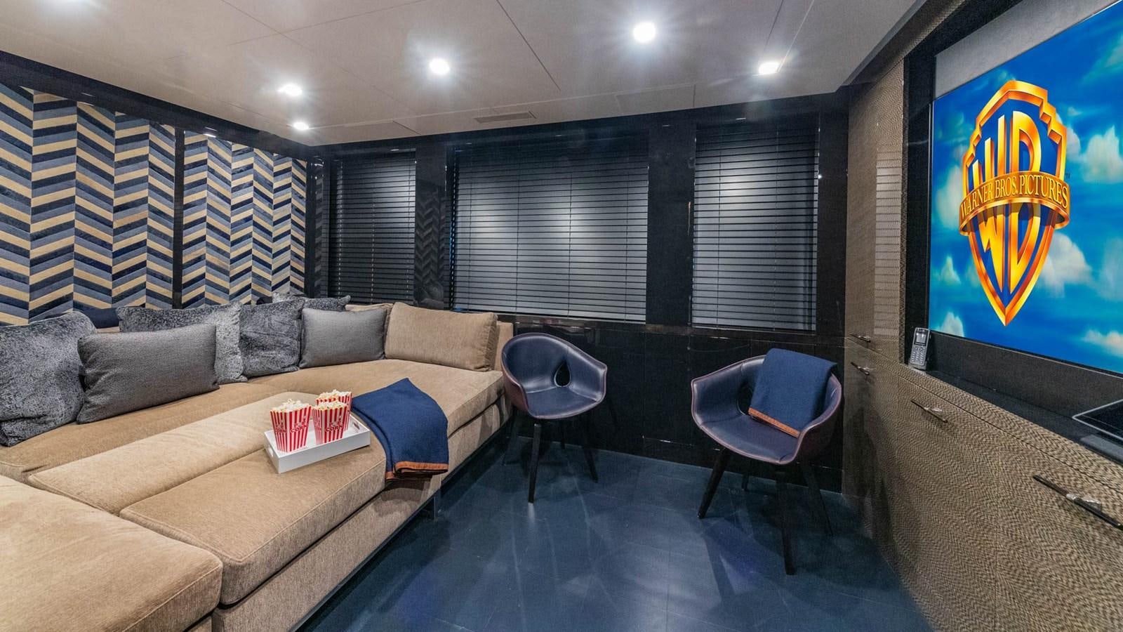 a living room with a couch and a tv aboard APRICITY Yacht for Sale