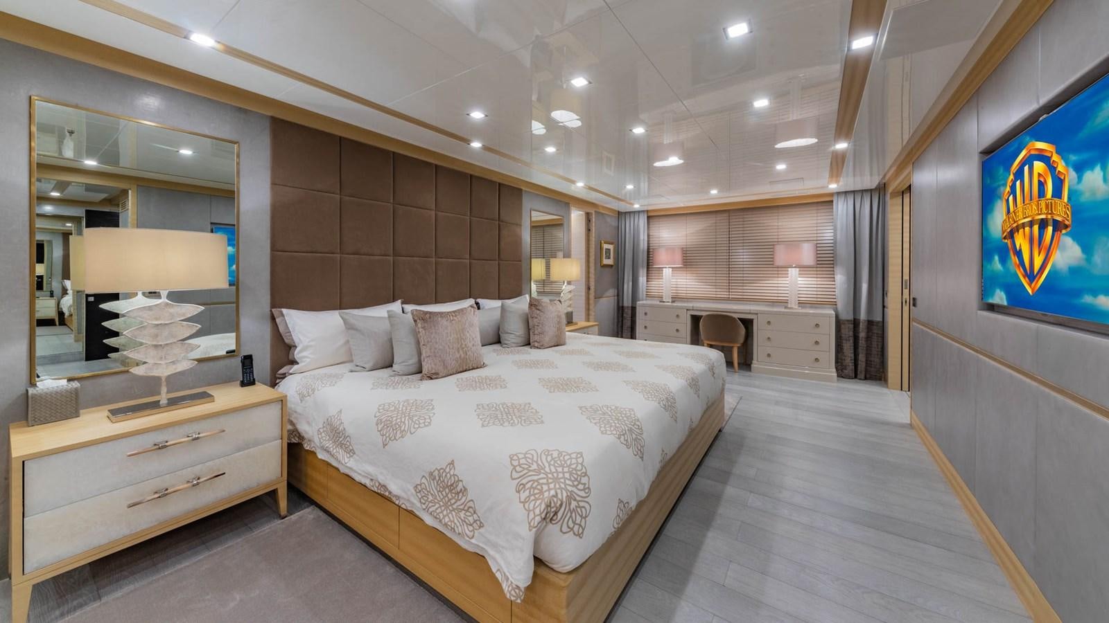 a large bedroom with a large bed aboard APRICITY Yacht for Sale