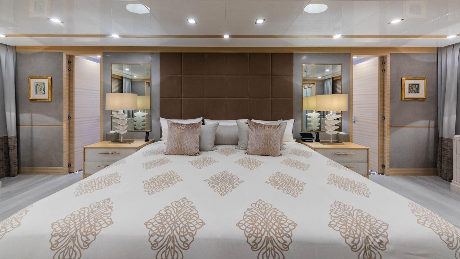 a large bed in a room aboard APRICITY Yacht for Sale