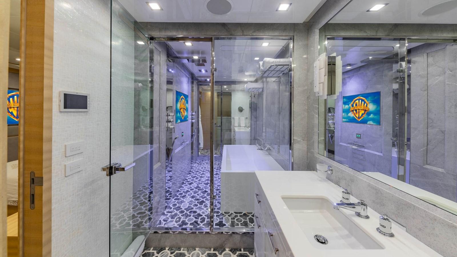 a bathroom with a sink and a mirror aboard APRICITY Yacht for Sale