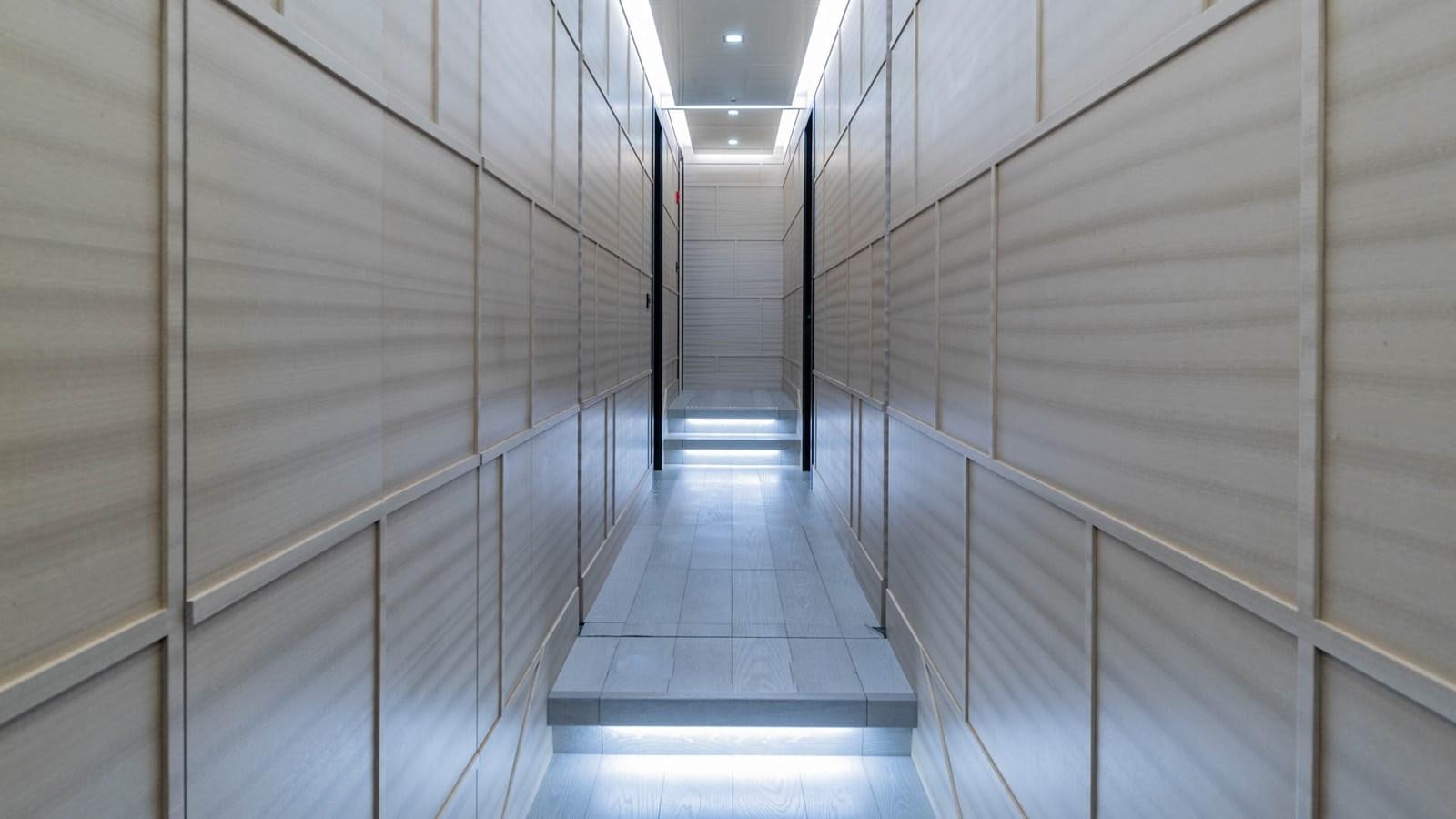 a hallway with a light aboard APRICITY Yacht for Sale