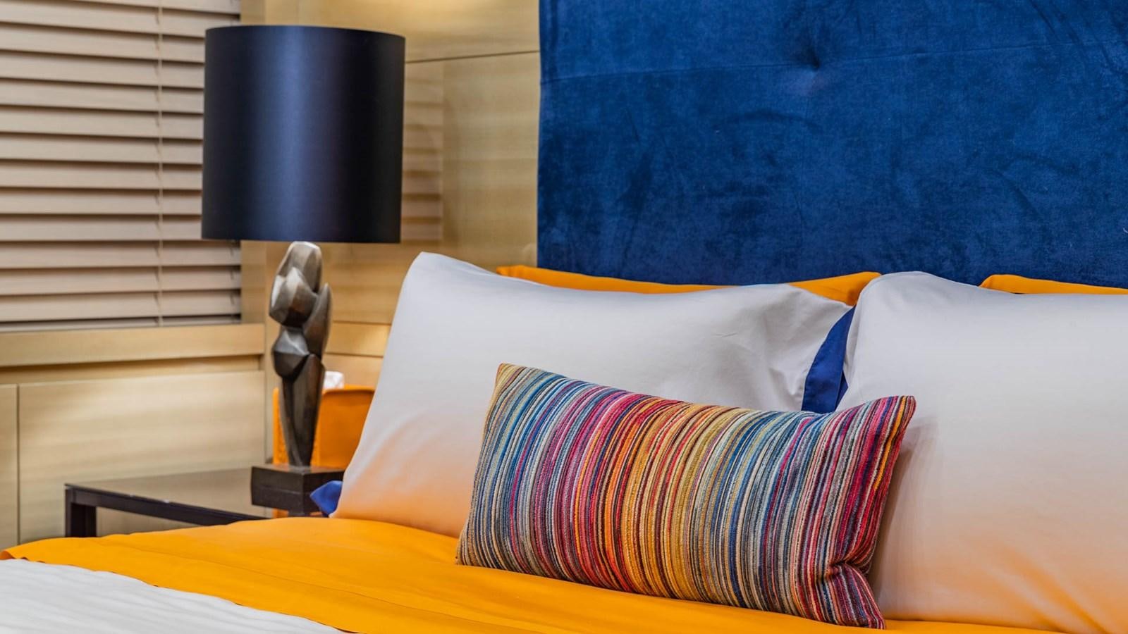 a shoe on a bed aboard APRICITY Yacht for Sale