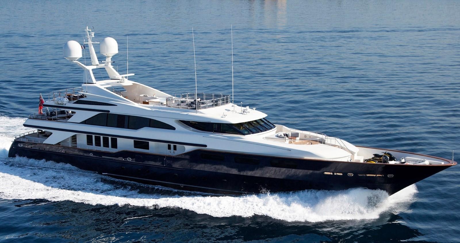 a white yacht on the water aboard COME PRIMA Yacht for Sale