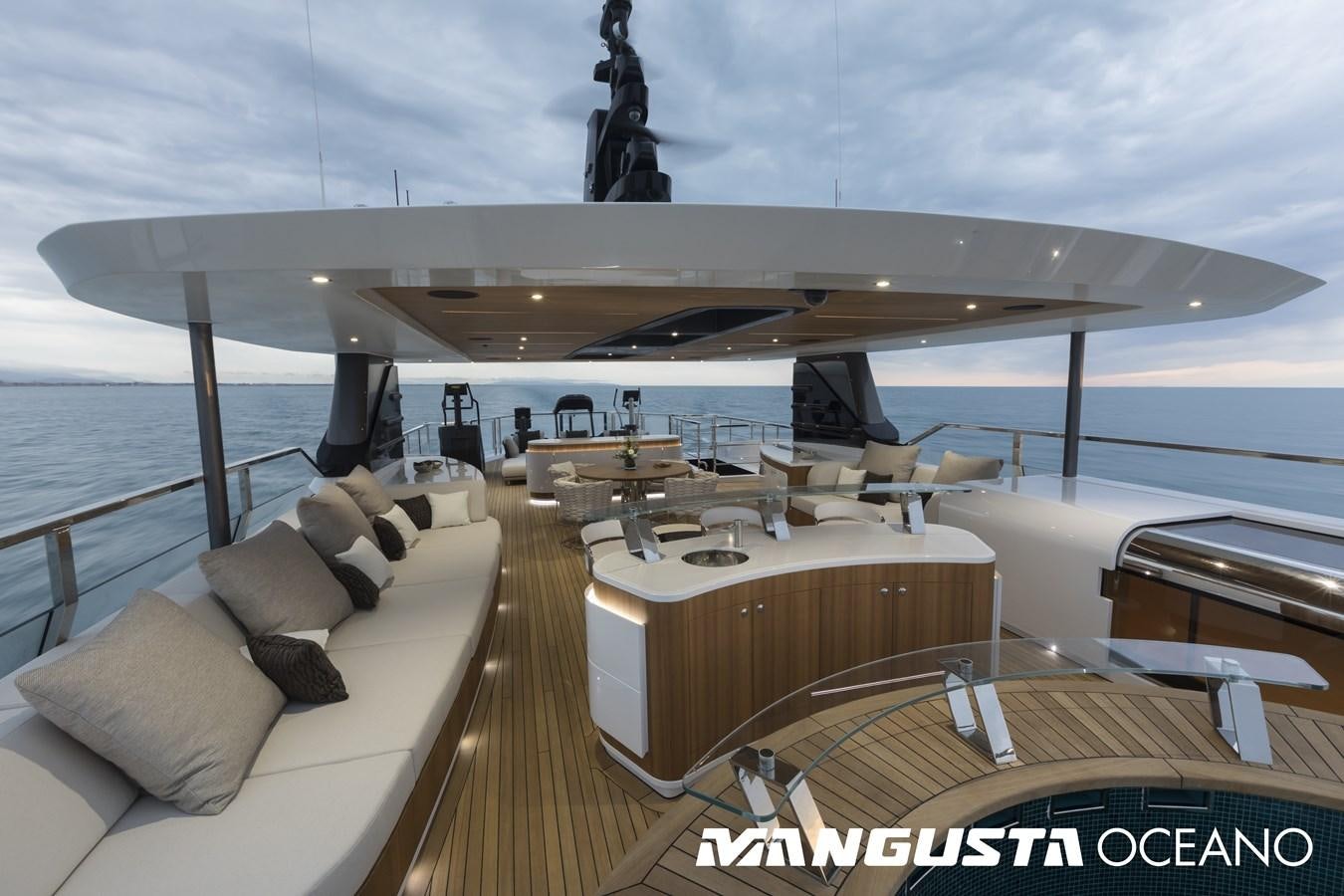 a large boat on a body of water aboard MANGUSTA OCEANO 50/06 Yacht for Sale