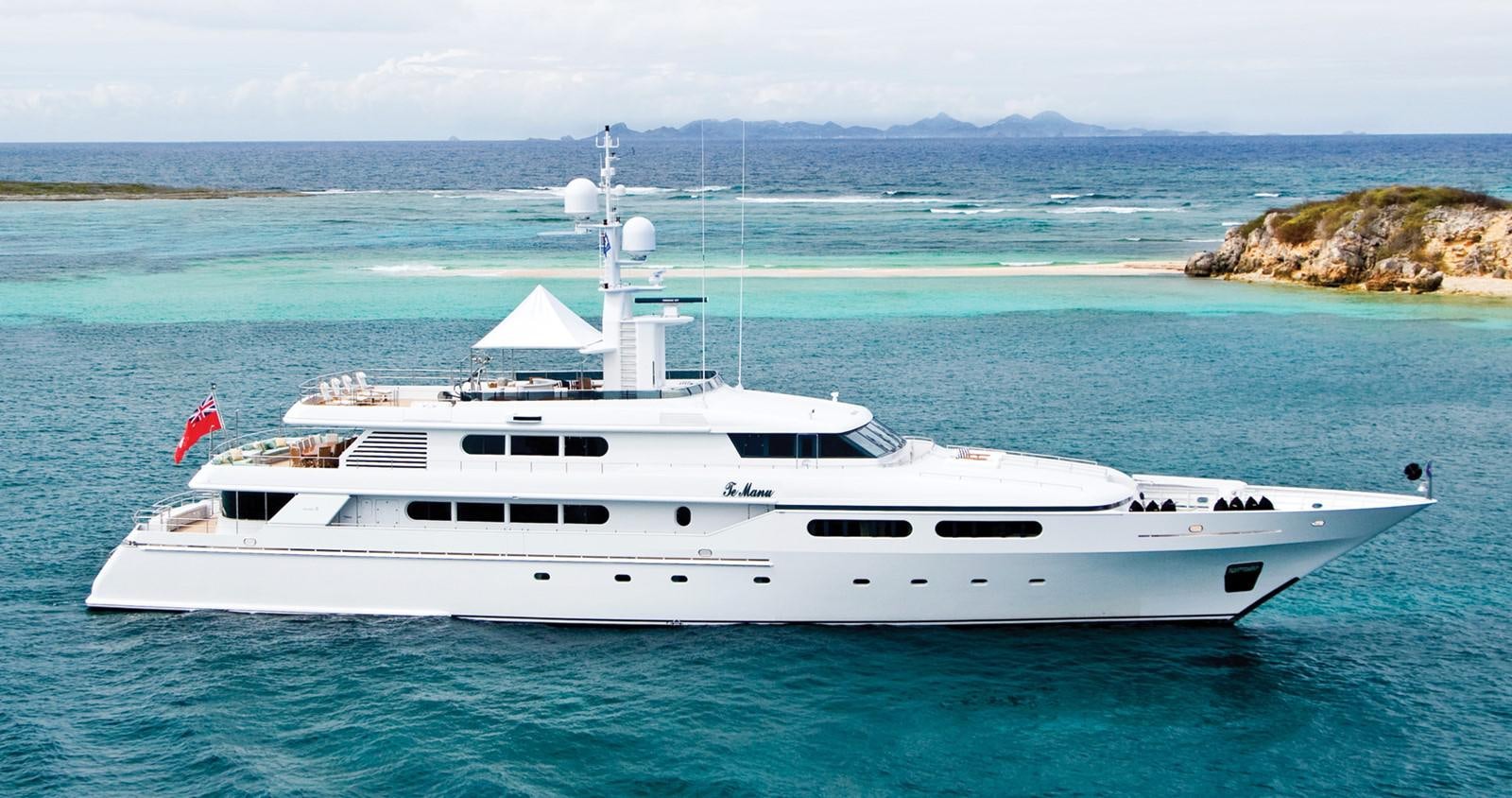 a white yacht in the water aboard TE MANU Yacht for Sale