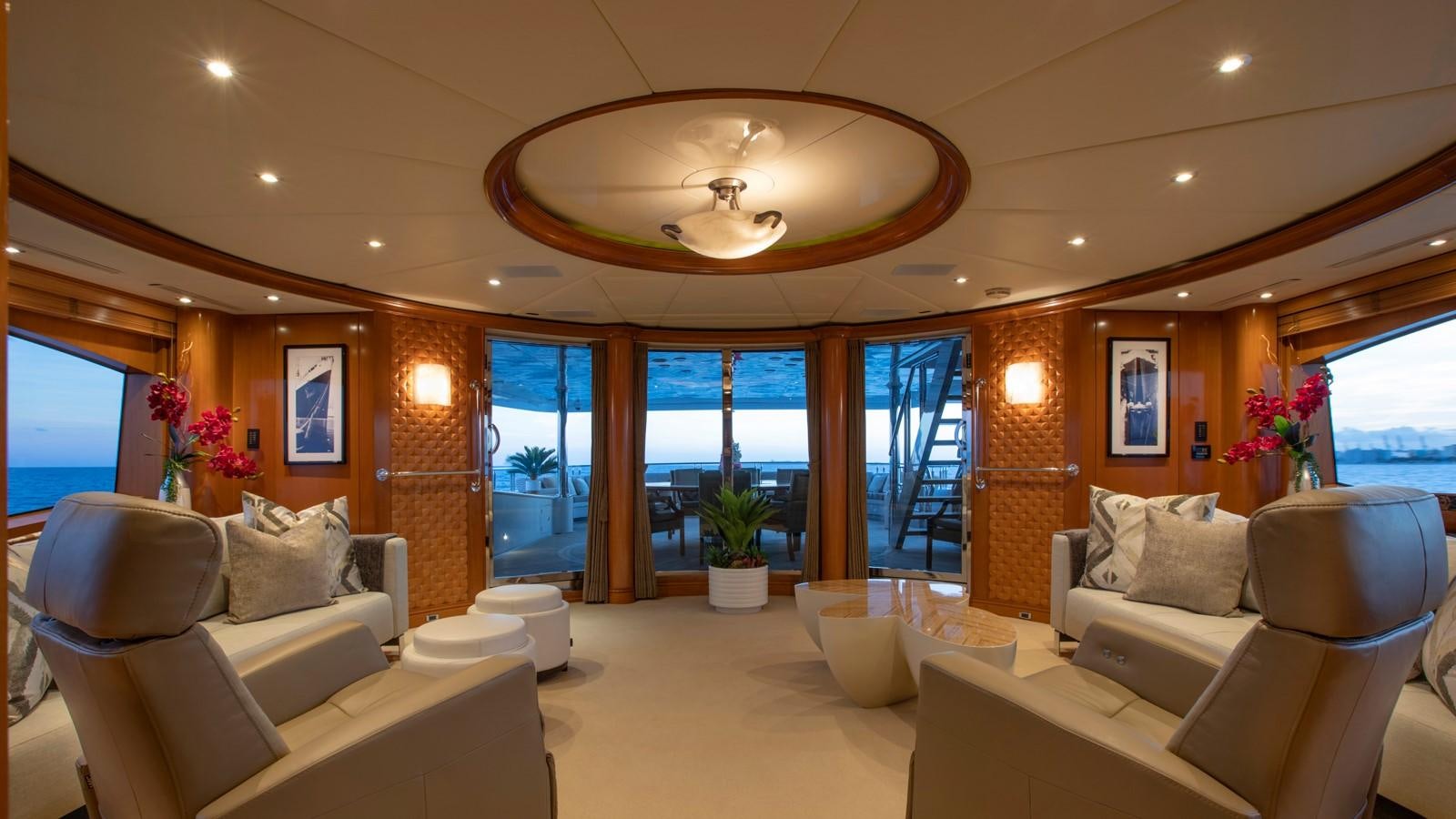 a living room with a large window aboard GLAZE Yacht for Sale
