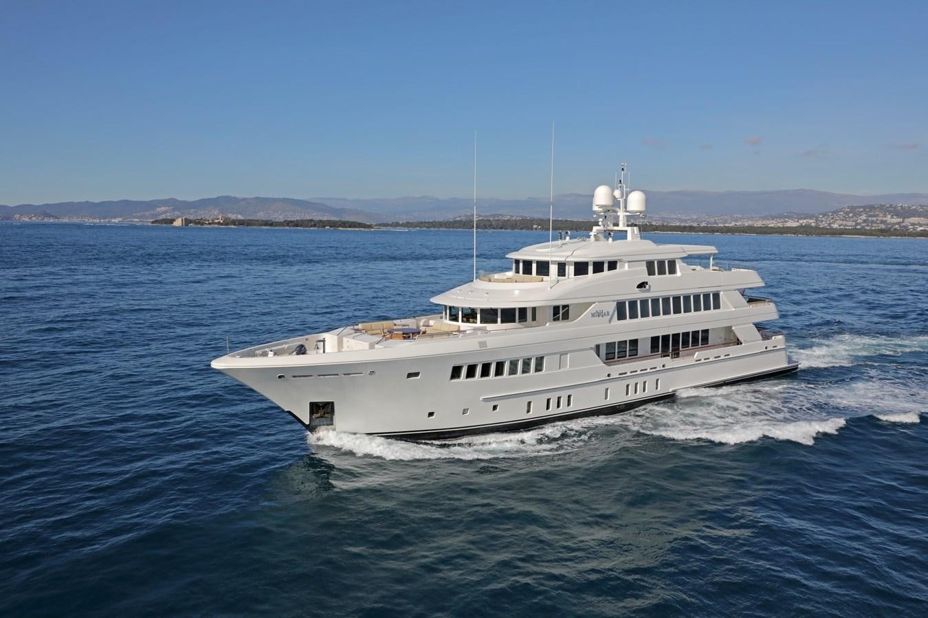a large white boat in the water aboard OLMIDA Yacht for Sale