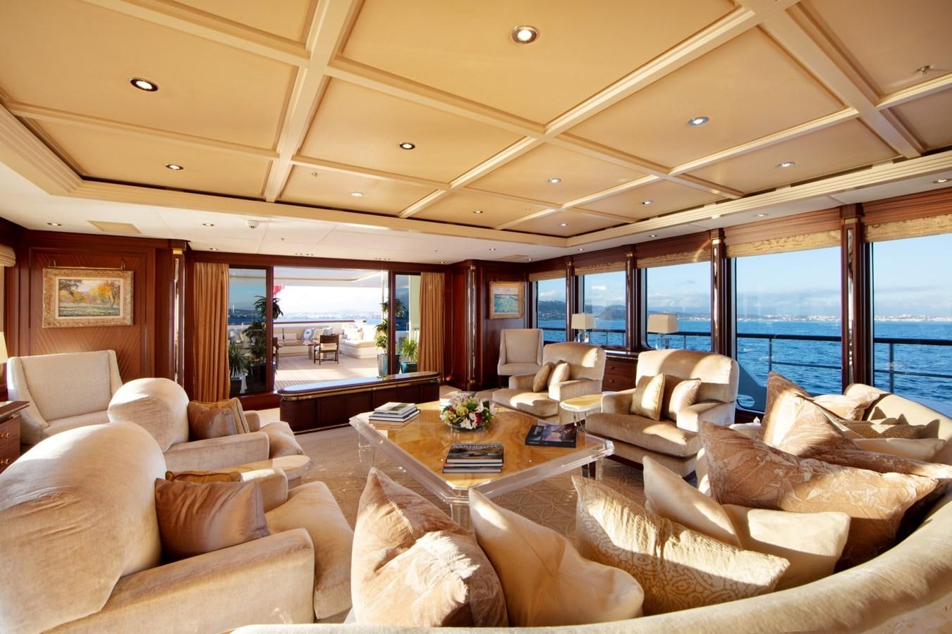 a living room with a large window aboard OLMIDA Yacht for Sale