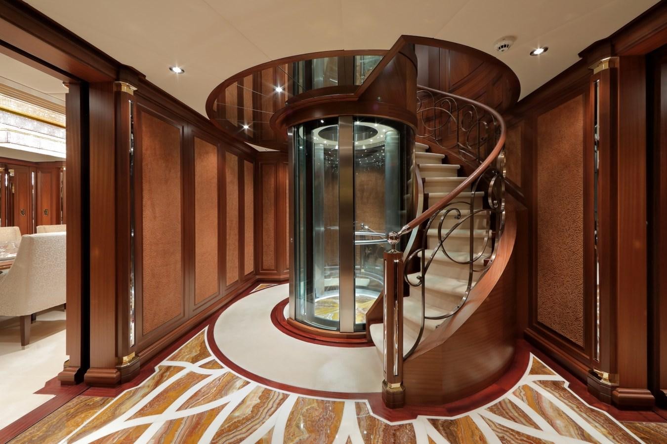 a room with a wood cabinet and a glass door aboard OLMIDA Yacht for Sale