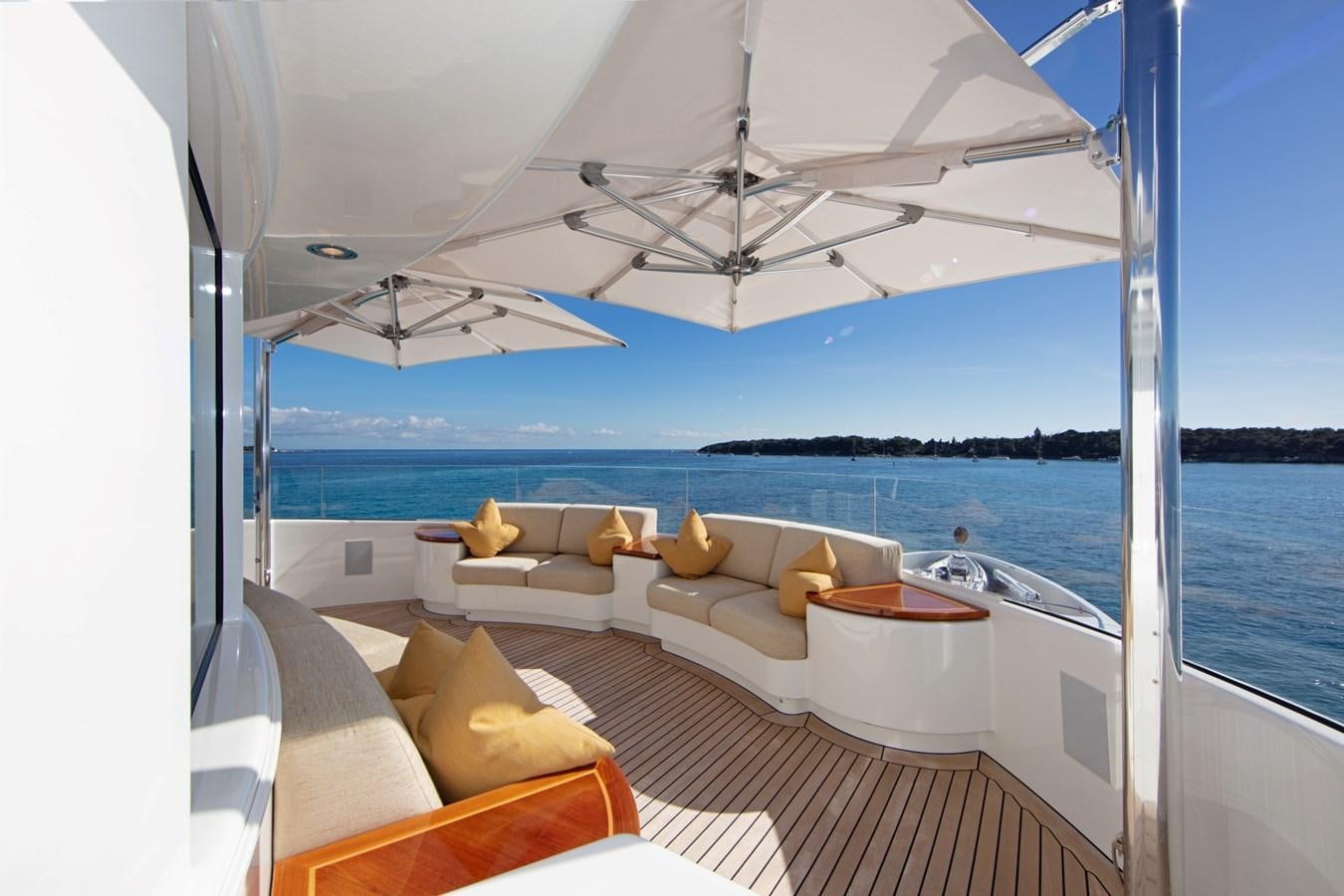 a large white lounge chair on a boat in the water aboard OLMIDA Yacht for Sale