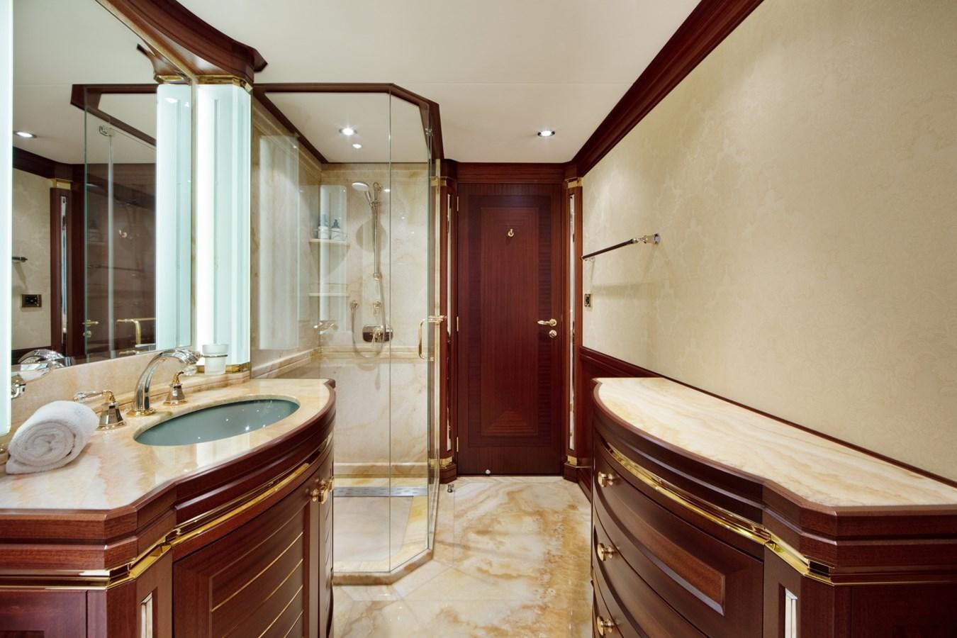 a bathroom with a shower unit and sink aboard OLMIDA Yacht for Sale