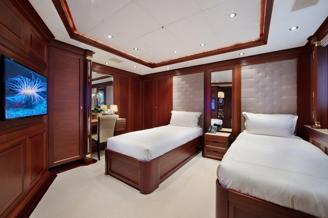 a room with two beds aboard OLMIDA Yacht for Sale
