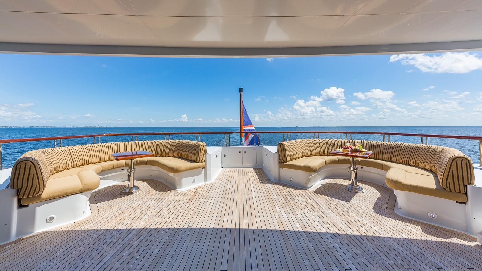 a room with a bed and a table aboard SORCHA Yacht for Sale