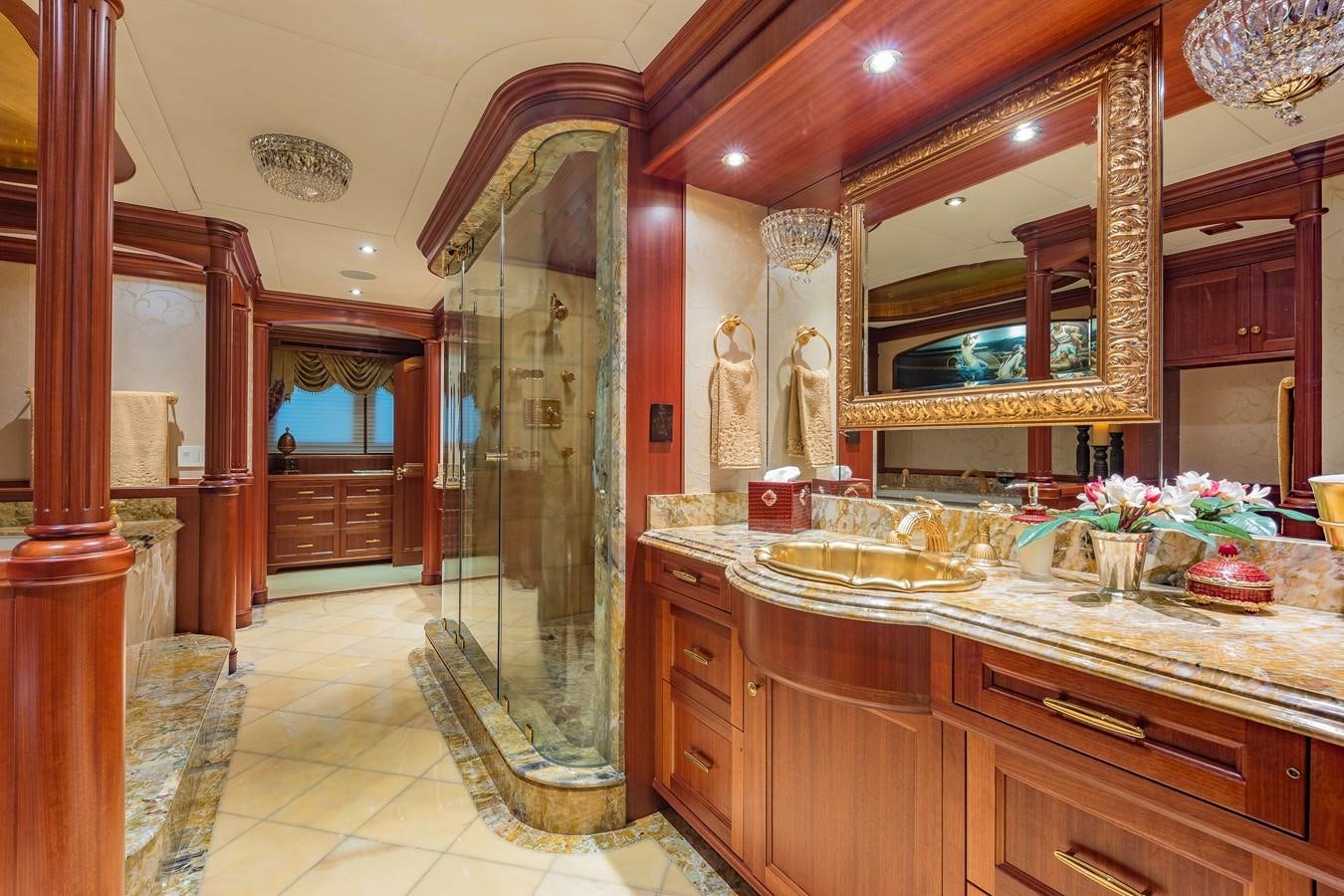 a kitchen with a large glass shower aboard SORCHA Yacht for Sale
