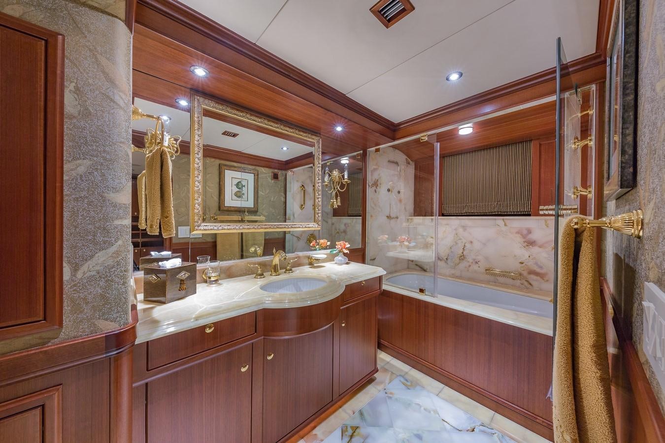 a bathroom with a large mirror aboard SORCHA Yacht for Sale