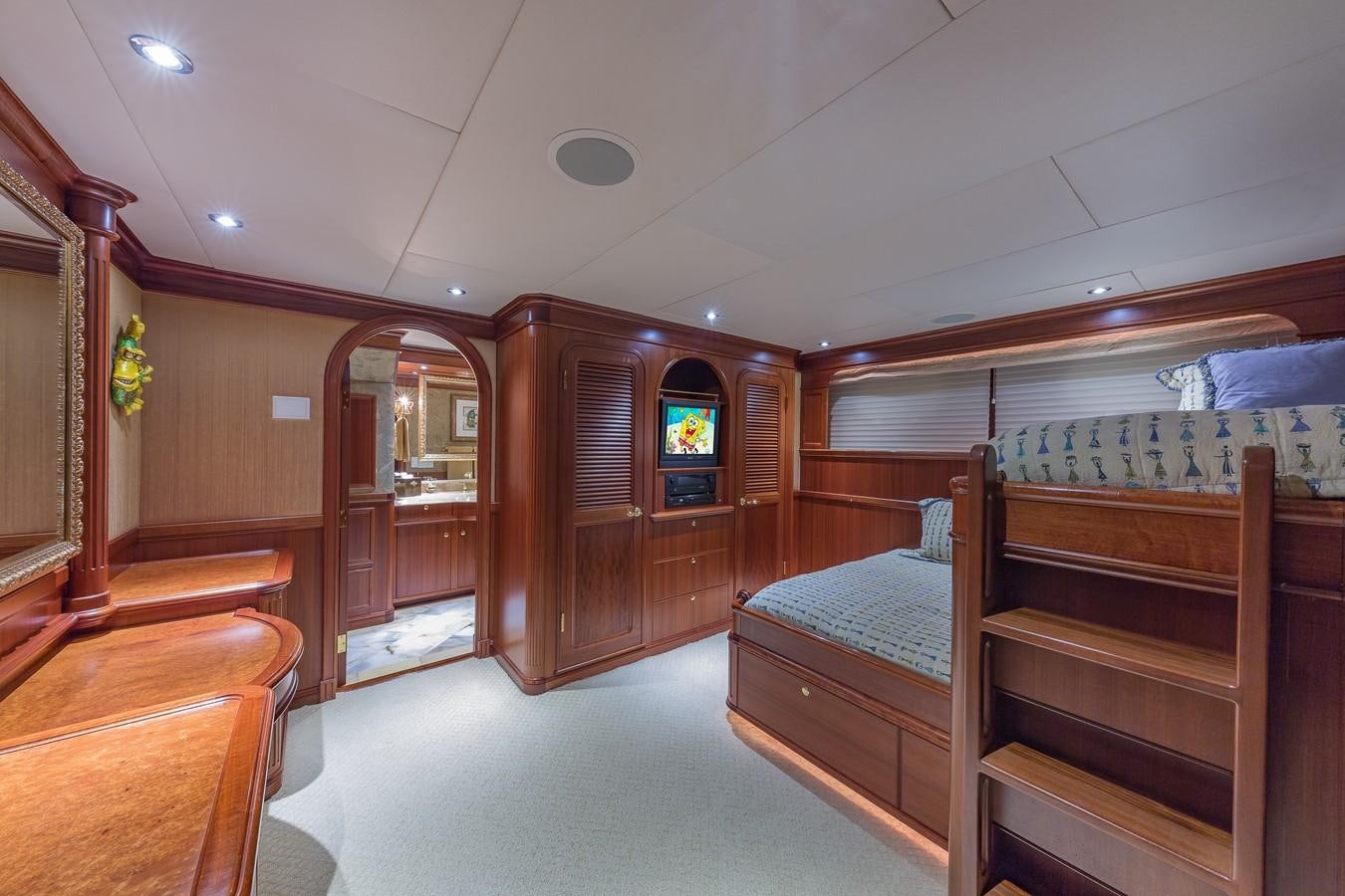 a room with a bed and a television aboard SORCHA Yacht for Sale