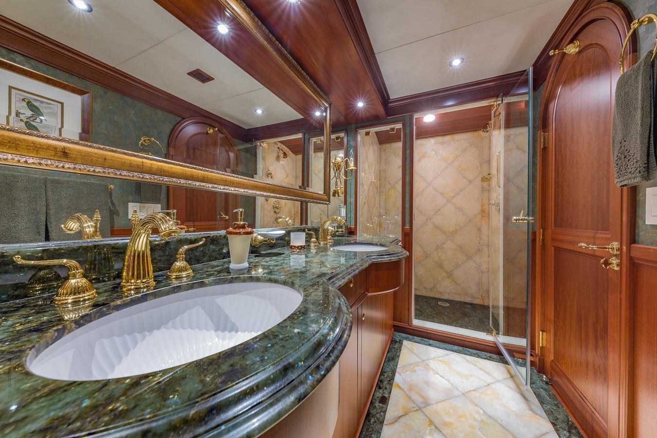 a bathroom with a large marble sink aboard SORCHA Yacht for Sale