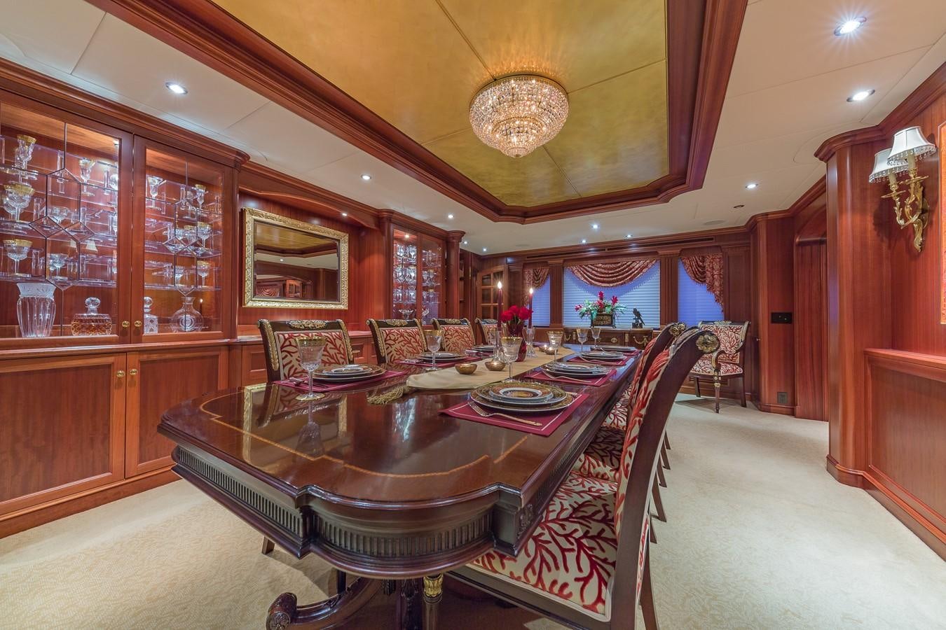 a large room with a table and chairs aboard SORCHA Yacht for Sale