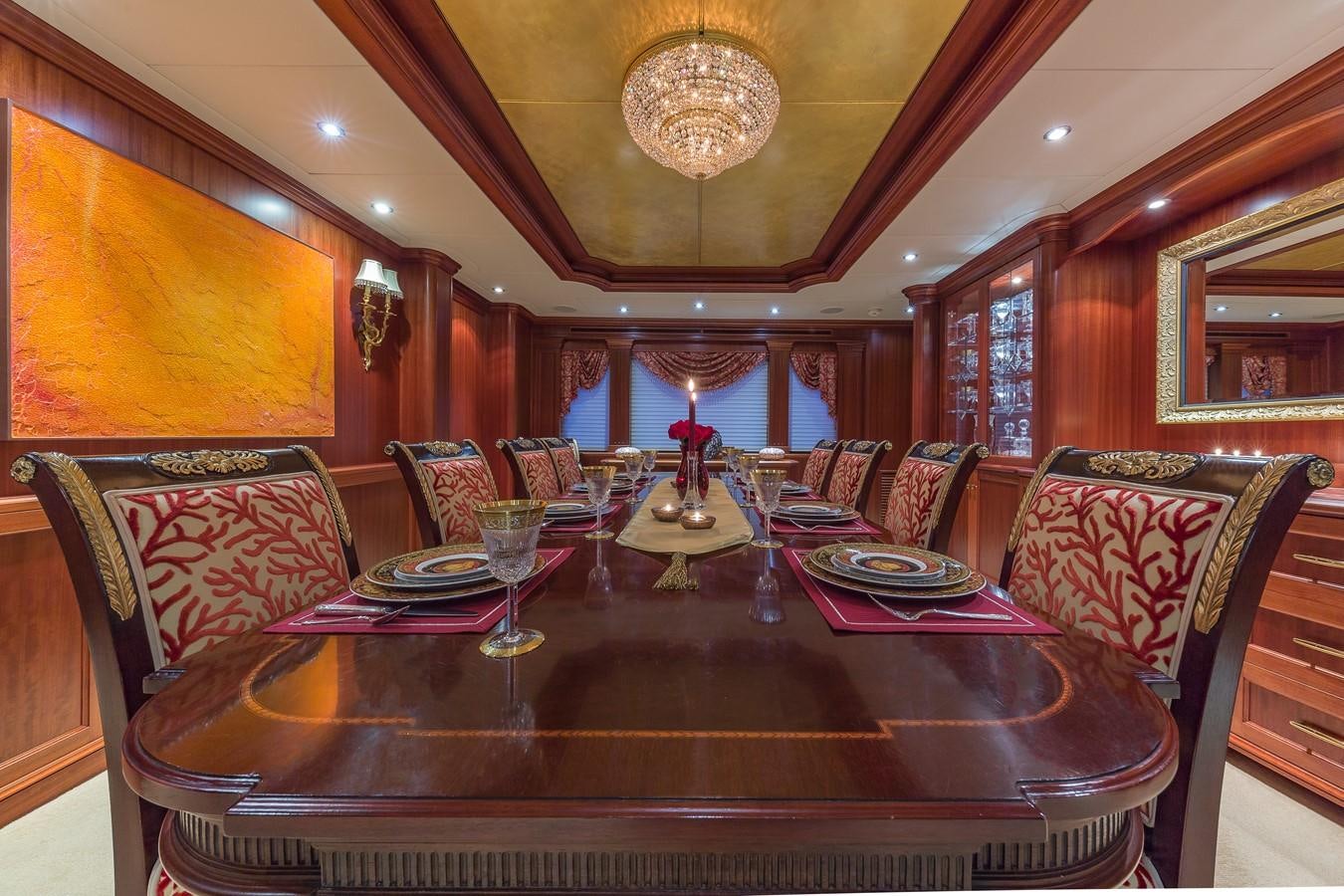 a dining room with a table set aboard SORCHA Yacht for Sale