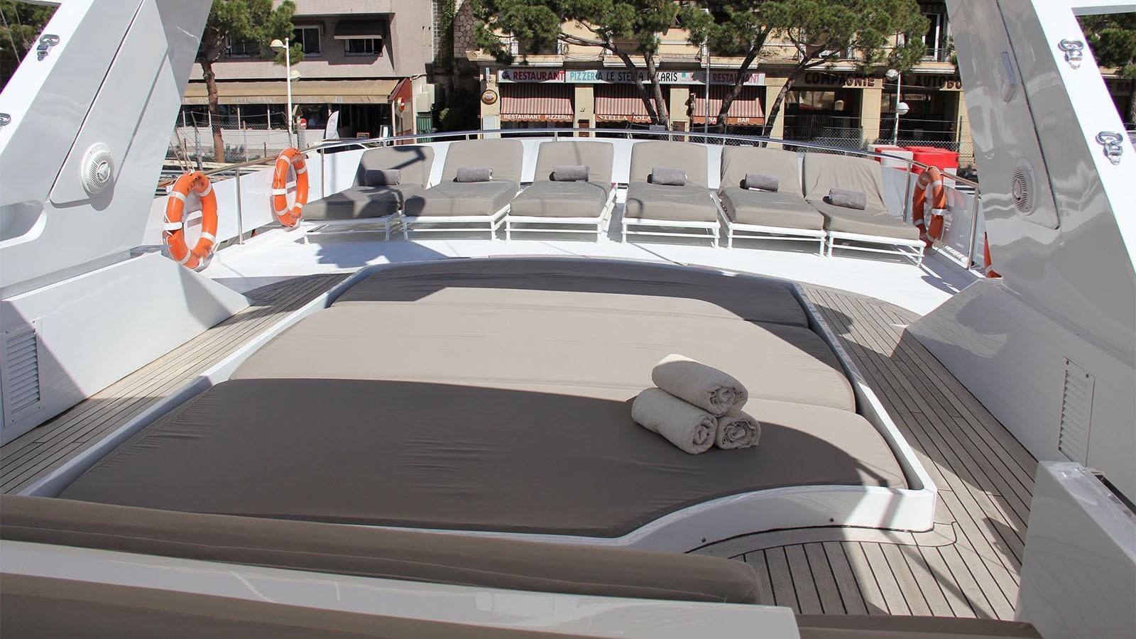 a large white pool with a dolphin on it aboard COSTA MAGNA Yacht for Sale