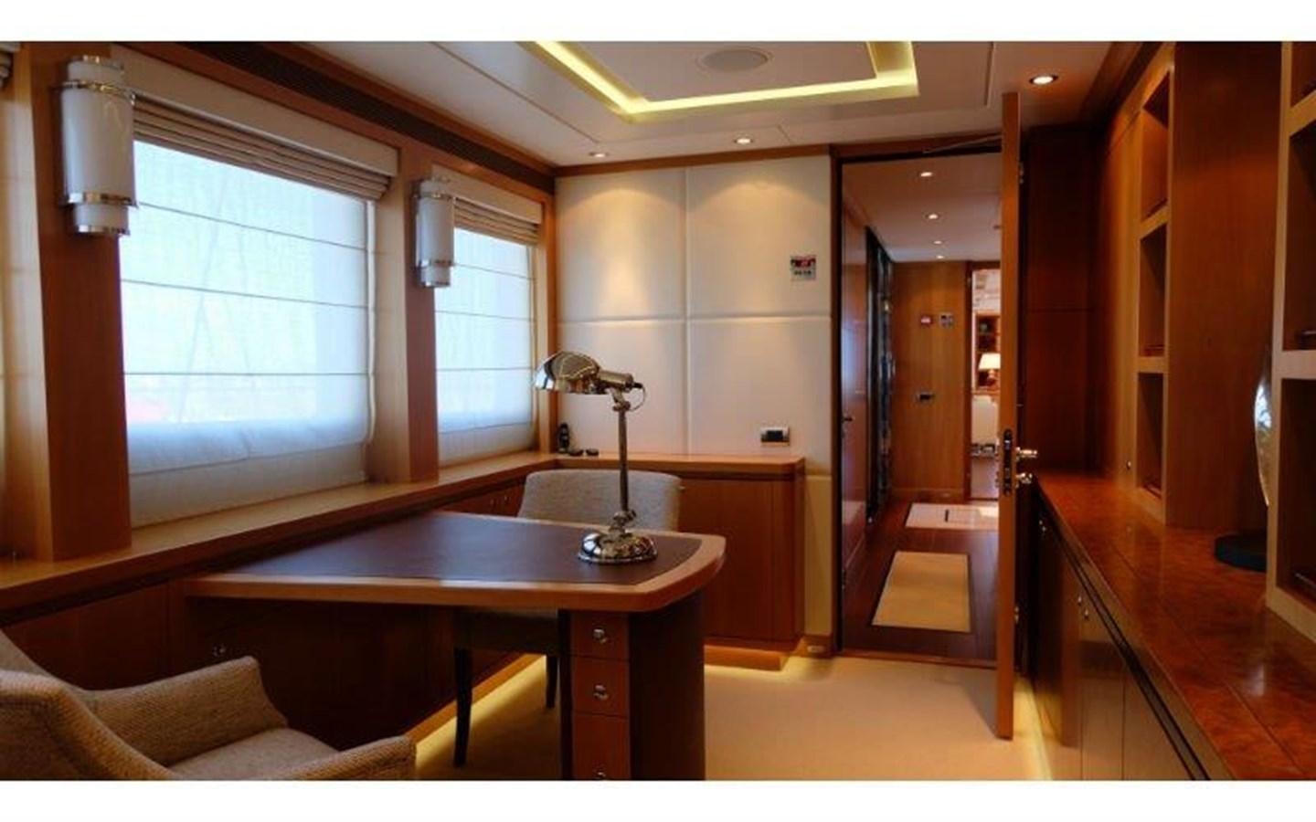 a kitchen with a table and a sink aboard MORDAN Yacht for Sale