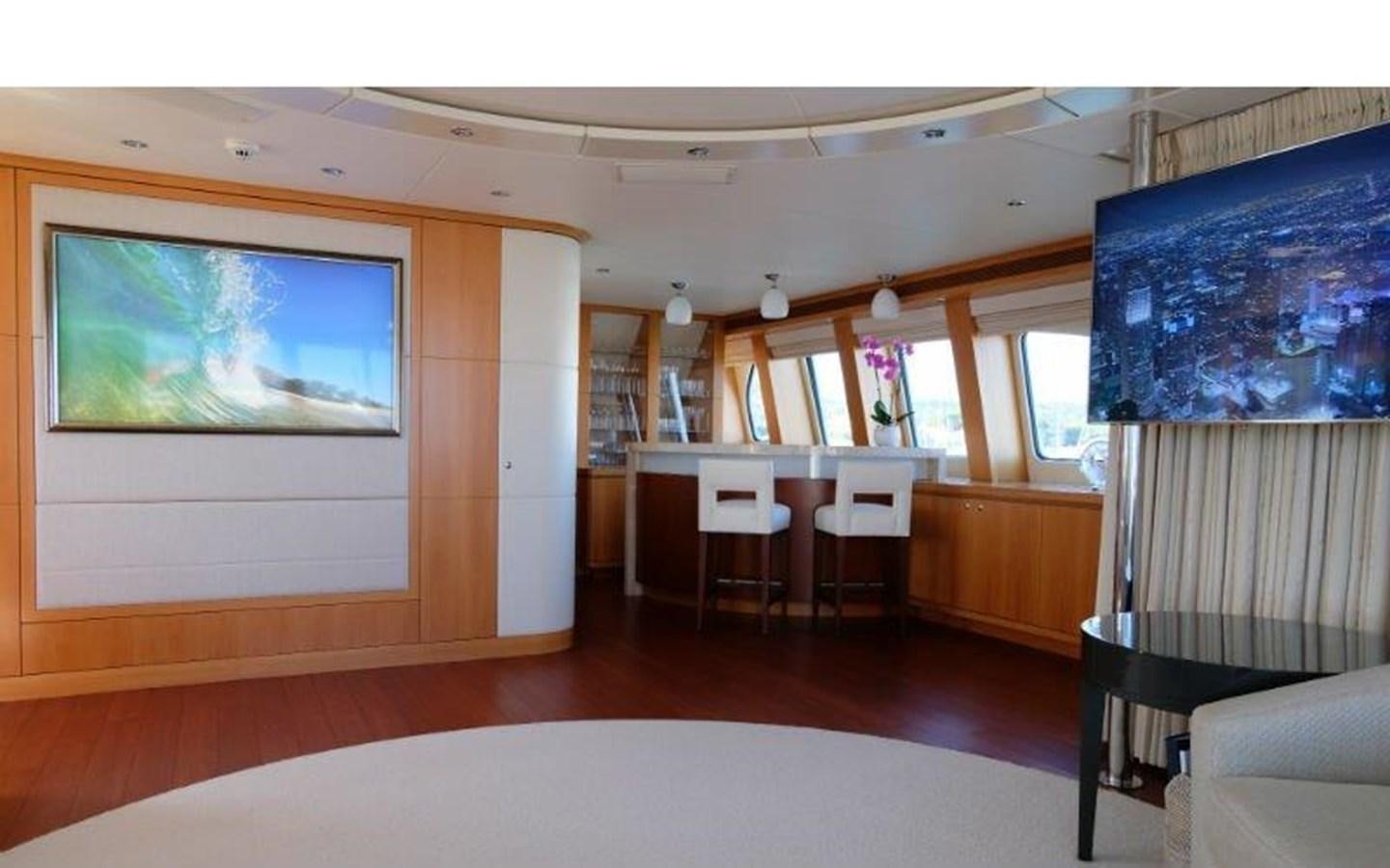 a room with a table and chairs aboard MORDAN Yacht for Sale