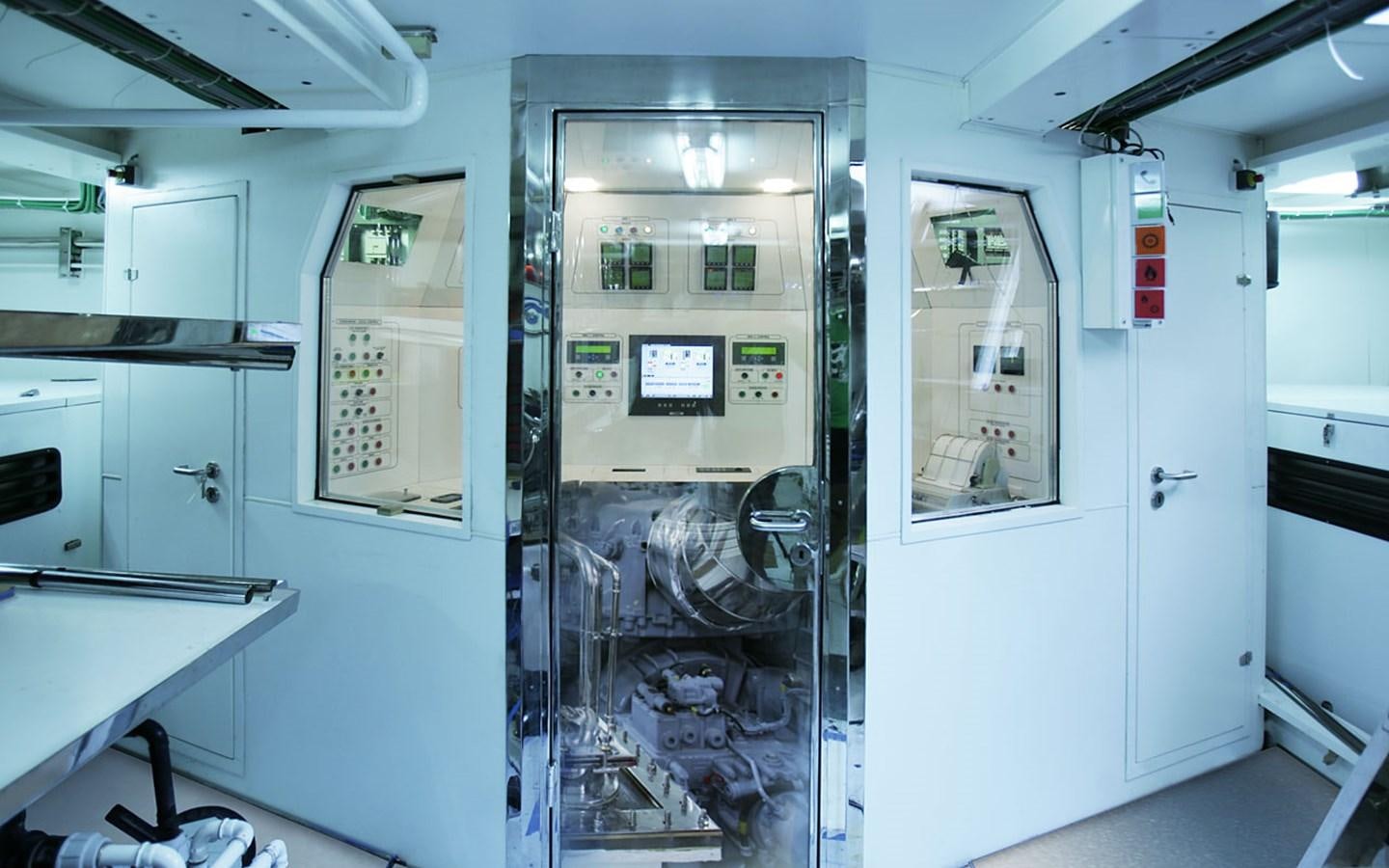 a room with white cabinets aboard PATRIOT 41 Yacht for Sale