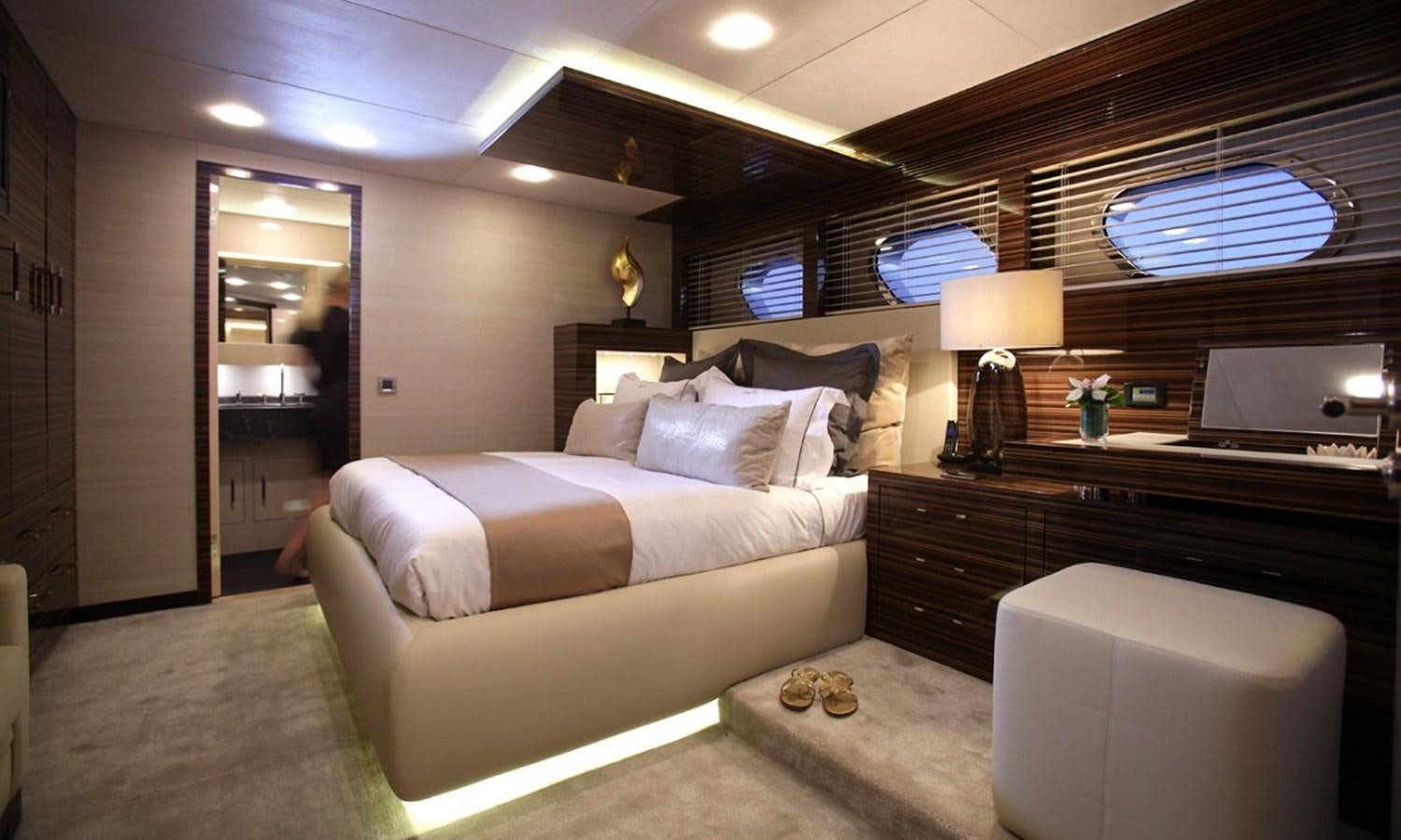 a bedroom with a large bed aboard PATRIOT 41 Yacht for Sale